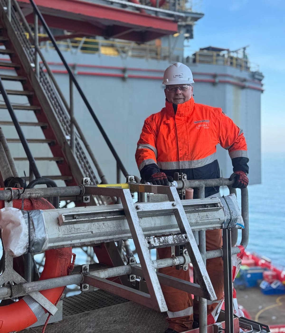 Akira Energy professional in workwear on an offshore platform